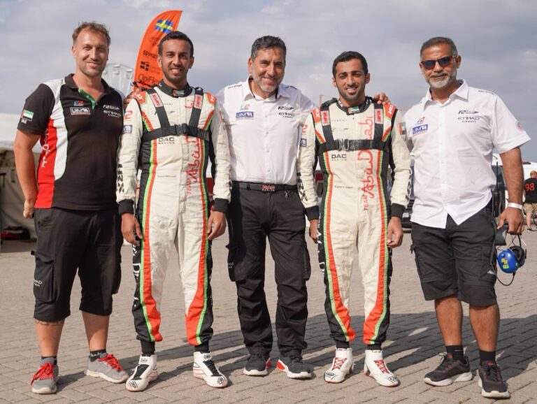 3.Team Abu Dhabi's Rashed  Al Qemzi and Mansoor Al Mansoori along with team manager Guido Cappellini