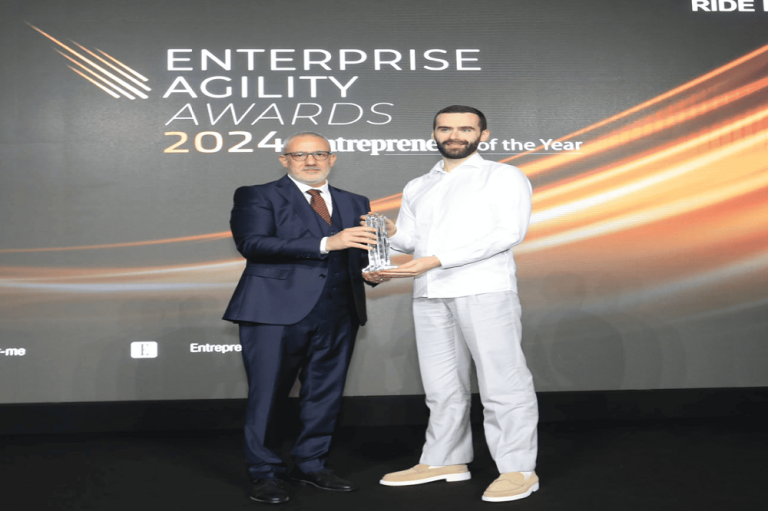 Islam Abdul Karim, Regional Head at Yango Middle East, receiving the Ride-Hailing App of the Year Award at the Enterprise Agility Awards